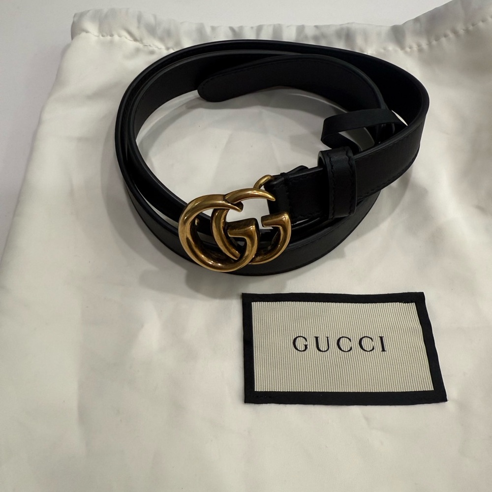 Gucci Black and Gold Leather Belt with Iconic GG Buckle